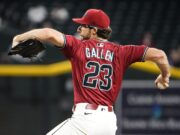 بطاقات البرية العمالقة المتنافسة ، D-Backs تفتح مجموعة حاسمة