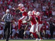 Emmett Johnson Powers Nebraska الماضي في ولاية ميشيغان